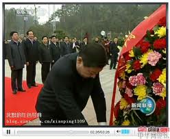 xi